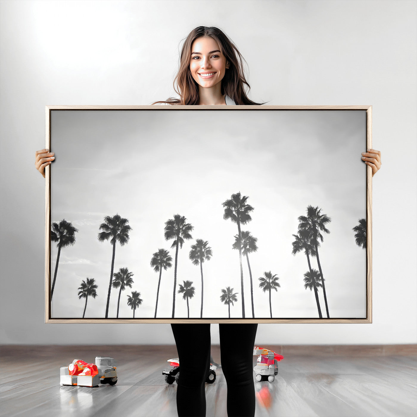 A black and white minimalist scene featuring tall palm trees silhouetted against a bright sky, creating a dreamy and timeless tropical aesthetic.