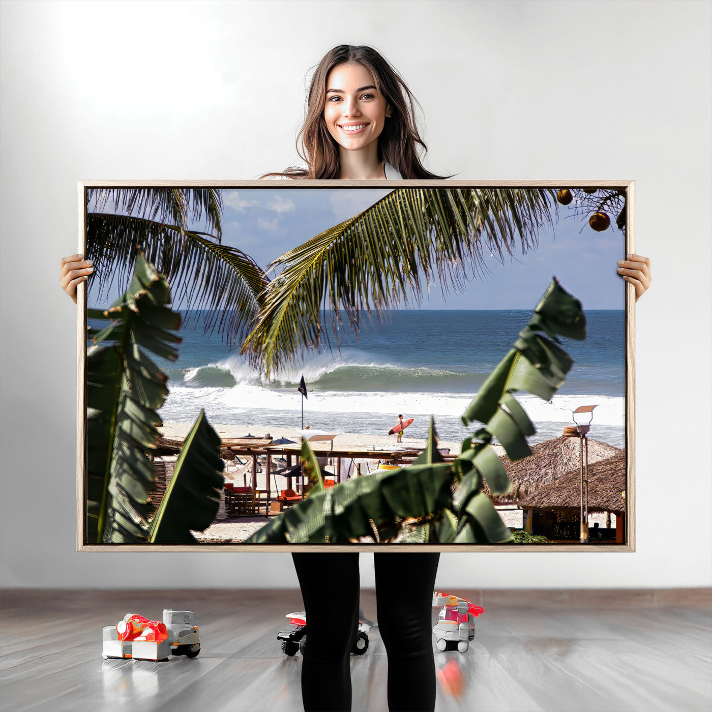 Canvas wall art of a tropical surf scene framed by palm trees, with a surfer on the shore and waves rolling in, ideal for beach-themed decor.