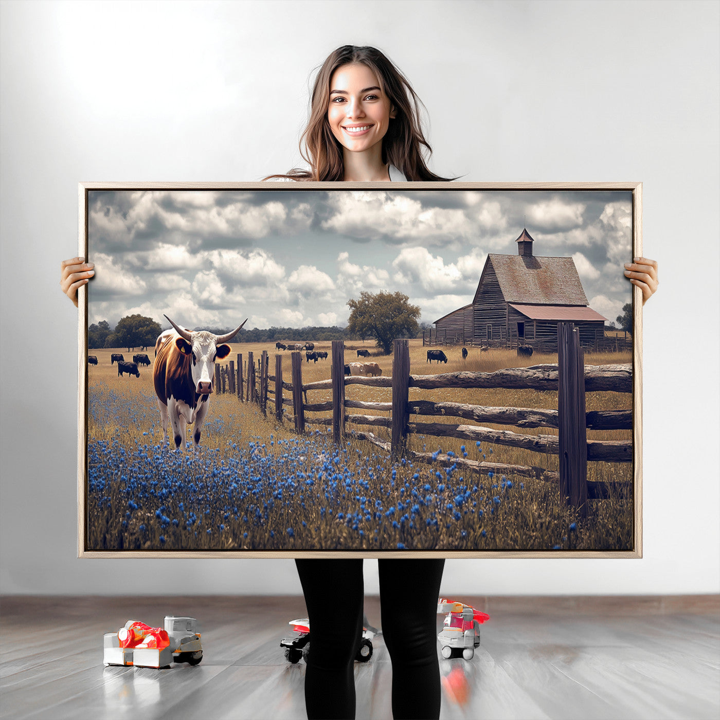 Framed canvas print of a Texas Longhorn near a rustic barn and fence, ideal for farmhouse or western-style home wall decor.