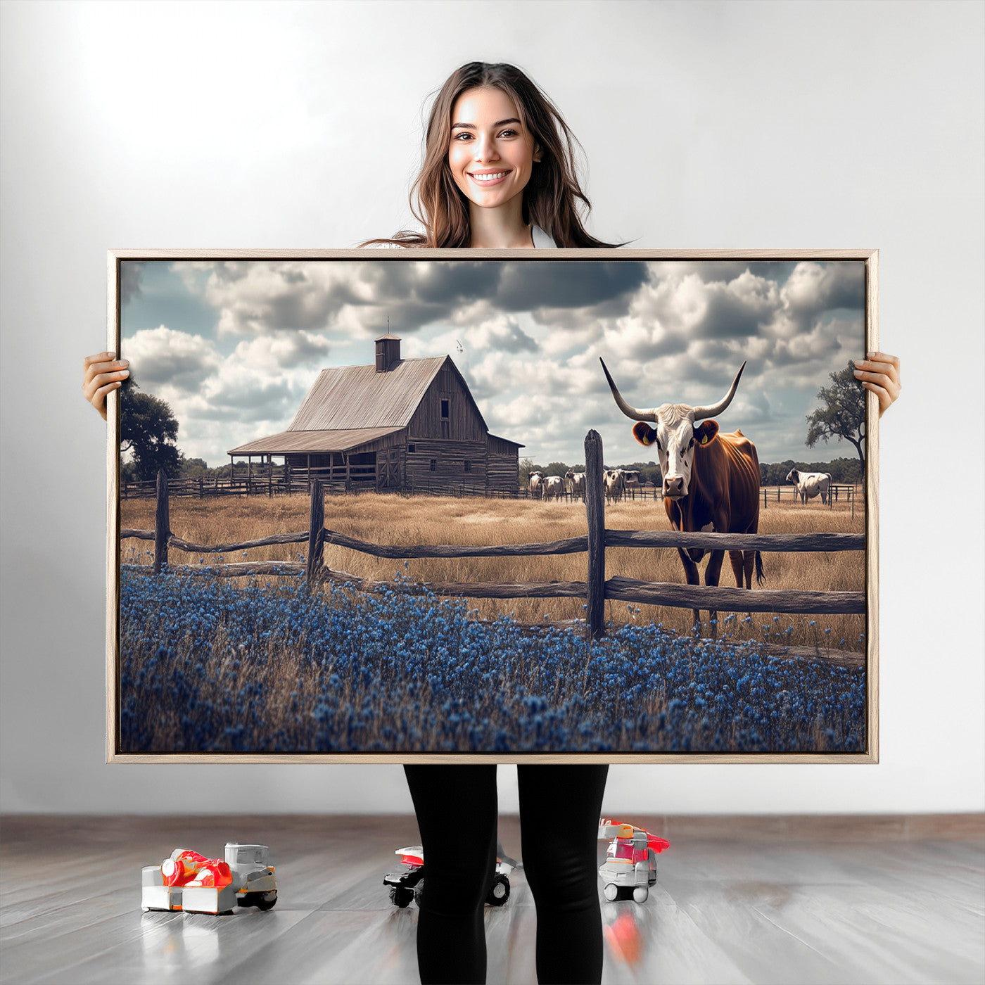Framed canvas art of a Texas Longhorn cow near a rustic barn and bluebonnet field, ideal for country-style or farmhouse wall decor.