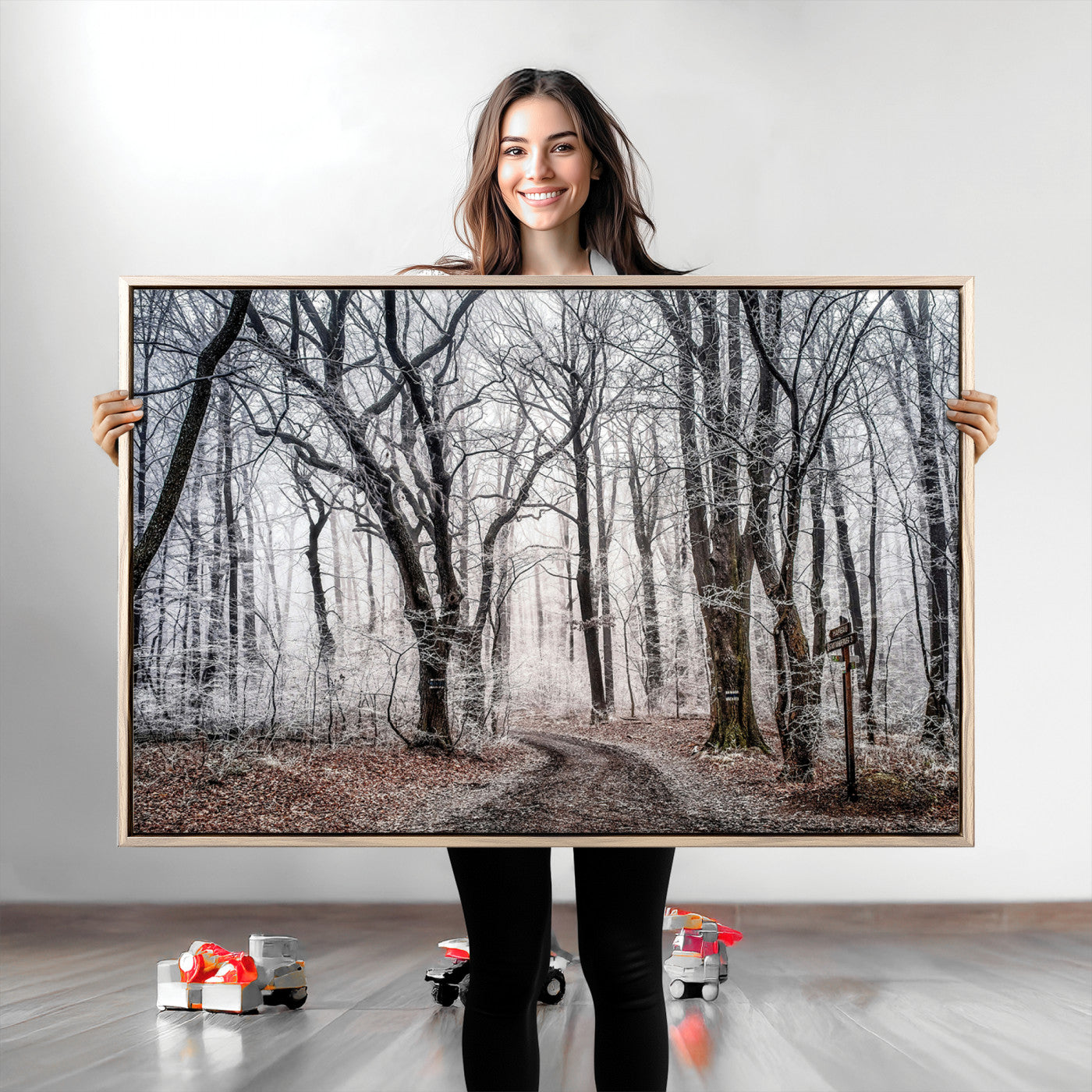 Snow-covered trees in a misty winter forest with a winding path, creating a serene and mysterious atmosphere, perfect for nature-inspired wall art.