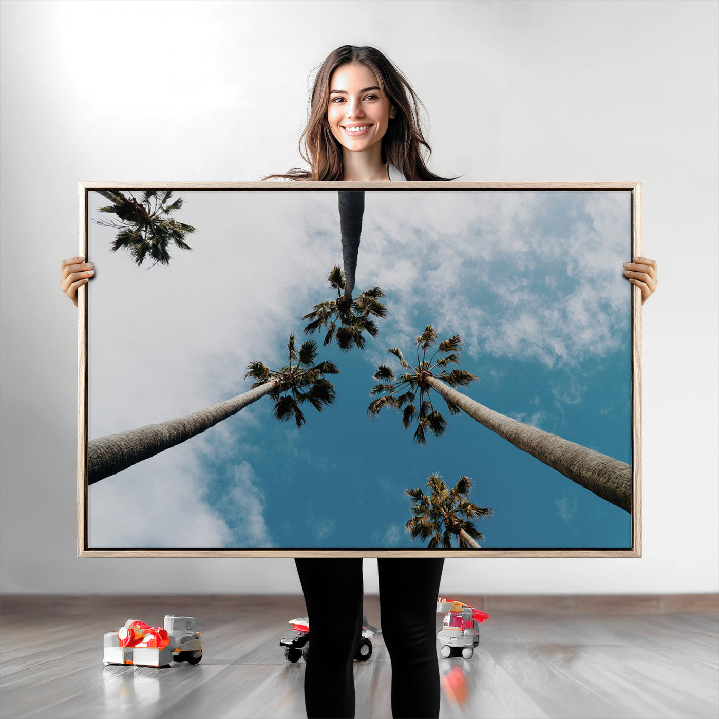 Looking up at tall palm trees against a bright blue sky with scattered clouds, creating a tropical and airy atmosphere for modern home decor.