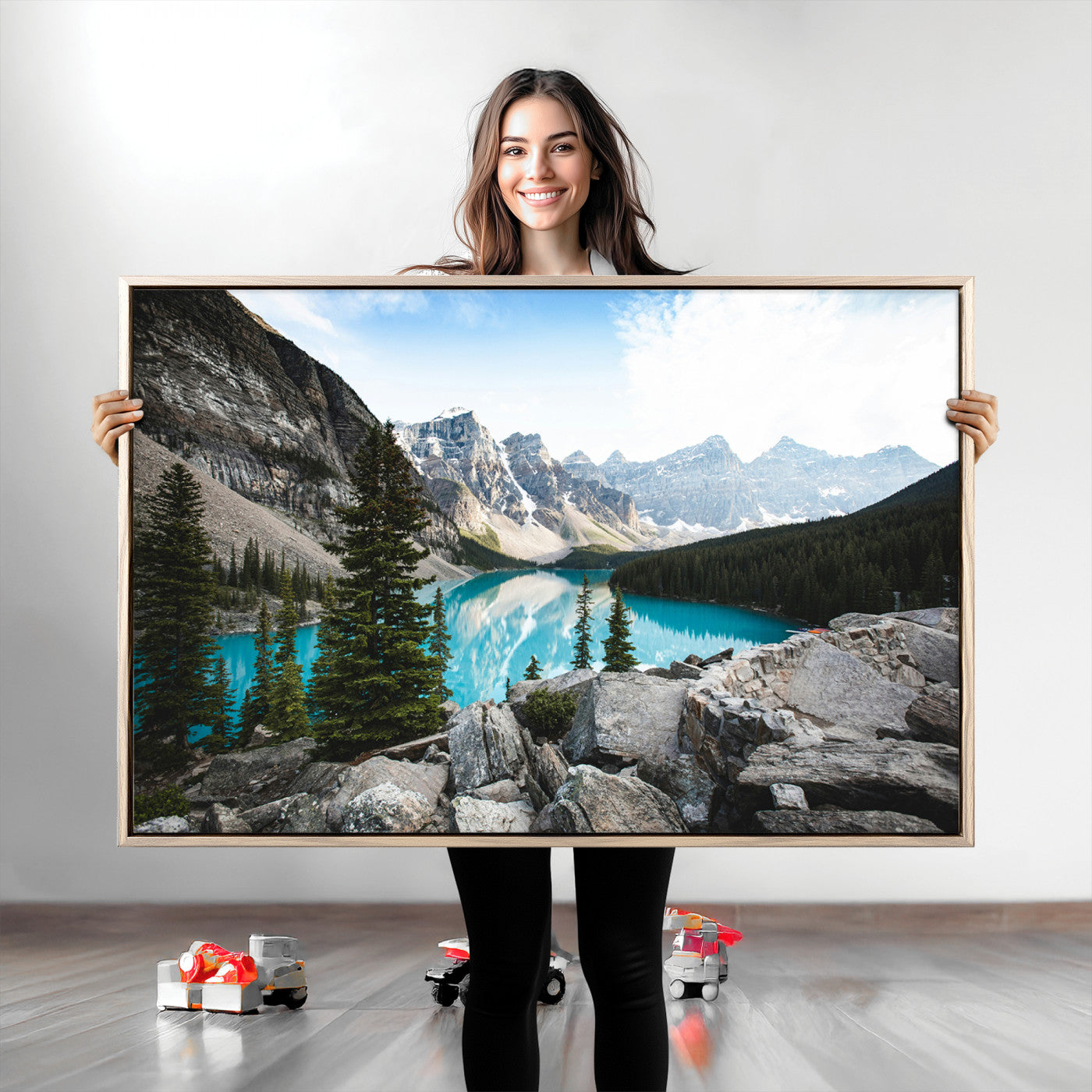 Stunning view of Moraine Lake with turquoise waters reflecting snow-capped mountains and evergreen trees, creating a peaceful alpine decor.
