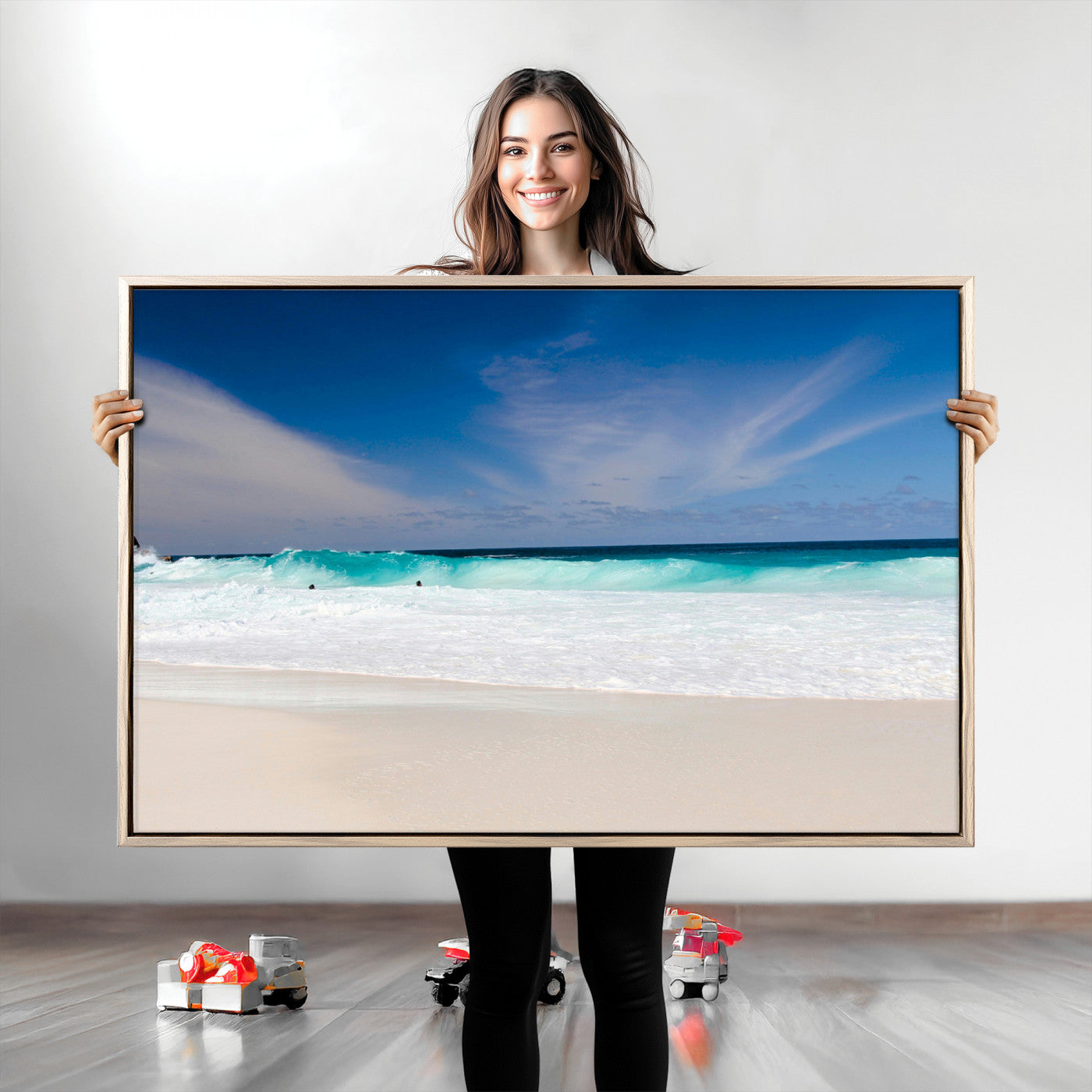 Turquoise waves crash onto a pristine white sand beach under a vivid blue sky with wispy clouds, creating a peaceful and refreshing coastal scene.