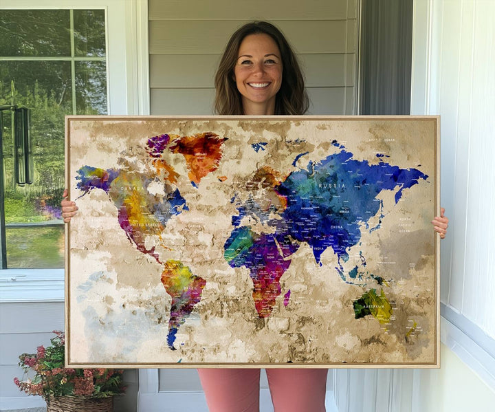 Watercolor World Map Canvas Print with gallery-wrapped edges.