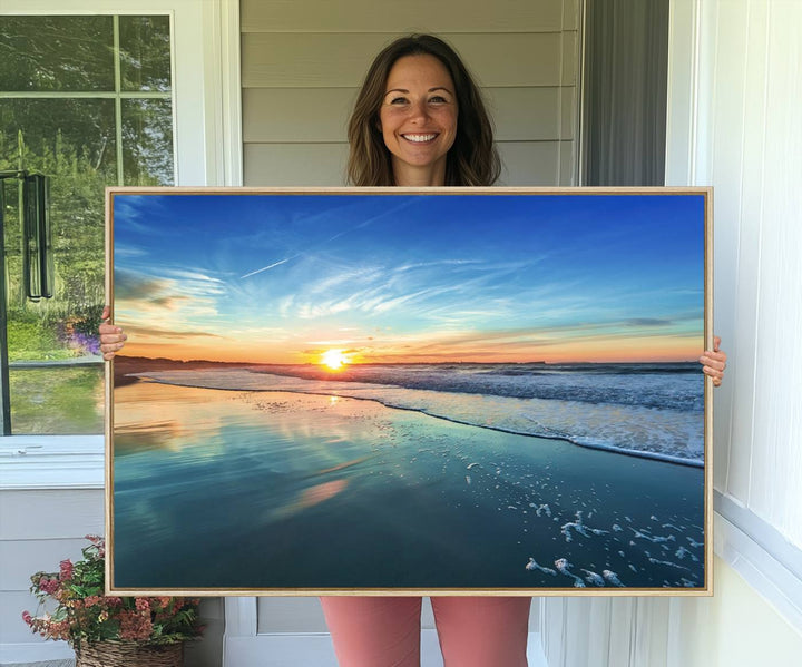 The Blue Sky and Beach Wall Art Canvas Print features a vibrant orange sky reflecting on wet sand.