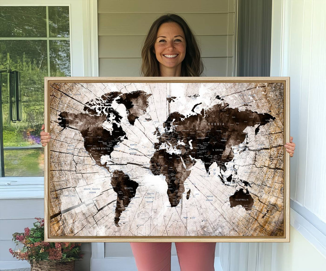 A Vintage World Map on Wood Style Canvas hangs prominently.