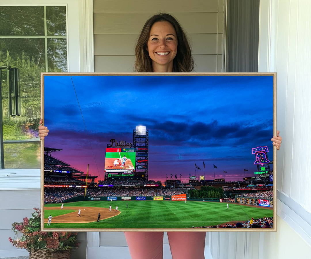 The Phillies canvas print captures a stunning sunset, vibrant signage, and players on the field.