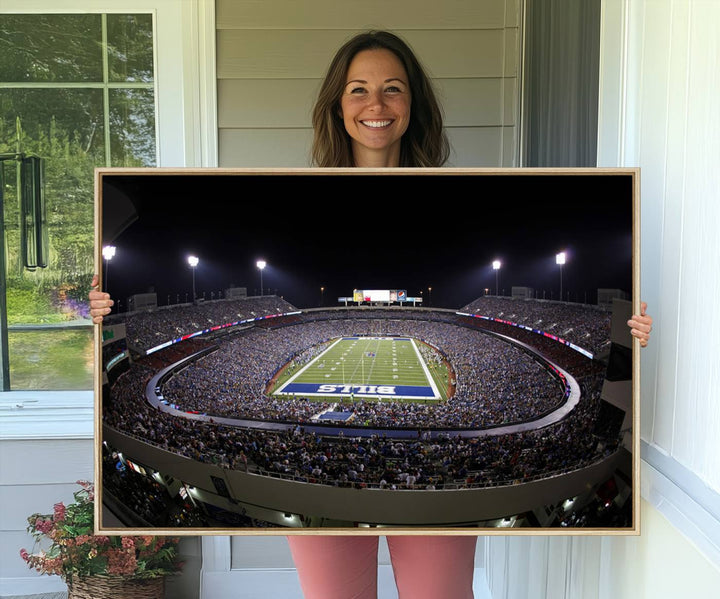 The Buffalo Bills NFL Highmark Stadium at night print captures the bright lights, conveying an exhilarating atmosphere.