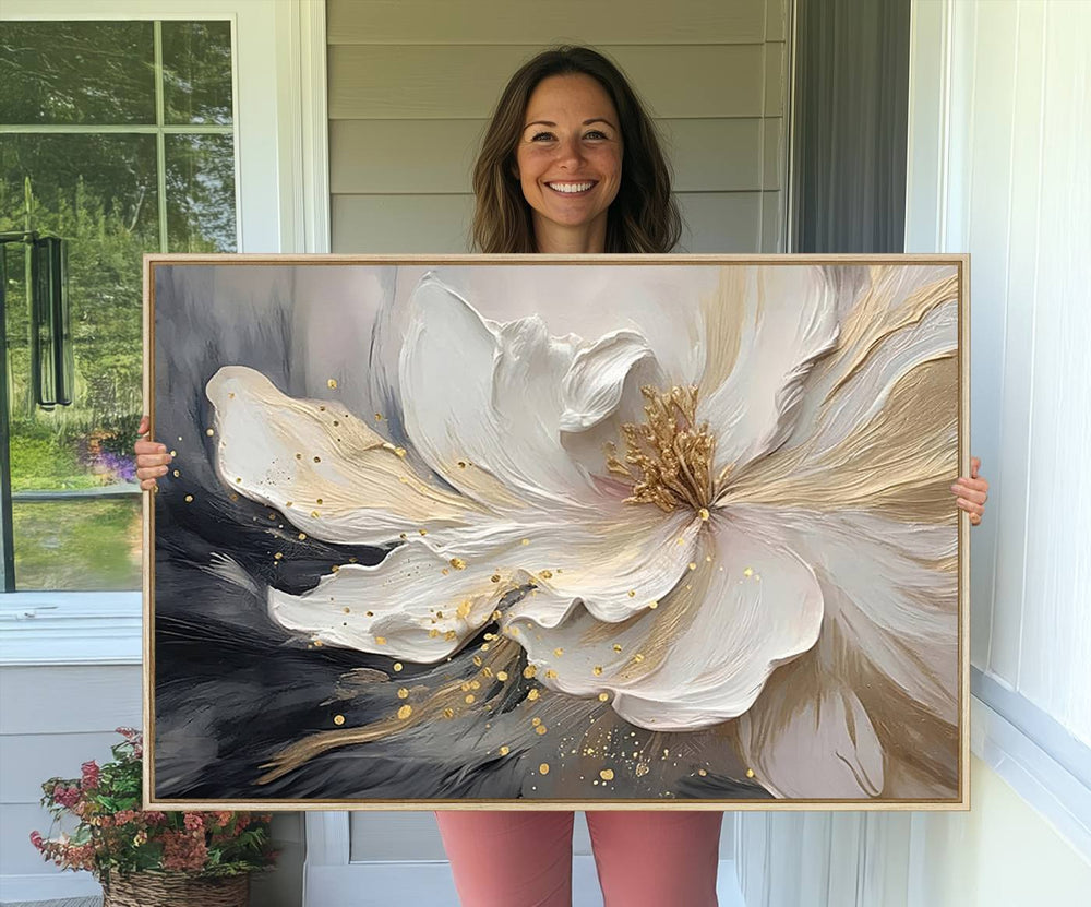 Elegant White and Gold Floral Triptych Canvas Art, a modern textured flower painting for home or office decor, features a blurred gray background.