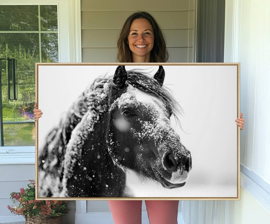 A large 3-panel rustic farmhouse wall art showcases a black and white winter horse canvas print against a snowy backdrop.