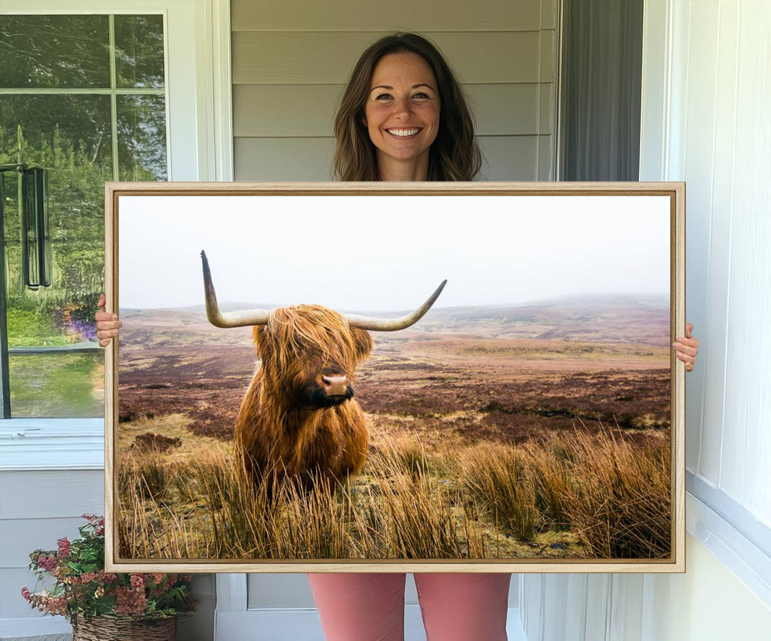 The Scottish Highland Cow Wall Art is perfect for rustic farmhouse decor, featuring misty moorland hues.