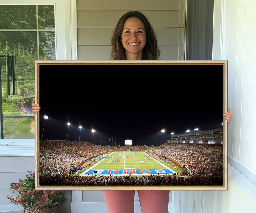 Wide-angle view of a vibrant painting depicting SMU Mustangs Football at Dallas Gerald J. Ford Stadium, capturing the energy and excitement of a filled stadium and brightly lit field.