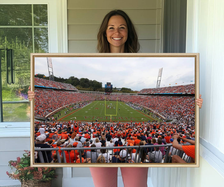 The Virginia Cavaliers Wall Art Canvas Print features a thrilling game at Scott Stadium surrounded by greenery.