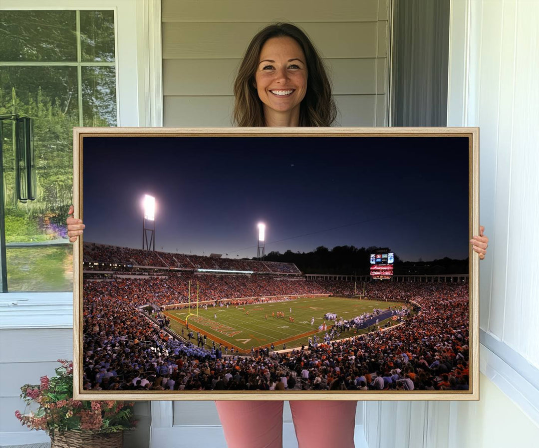 A nighttime game at Scott Stadium, floodlit—a scene from the Virginia Cavaliers Football art print.