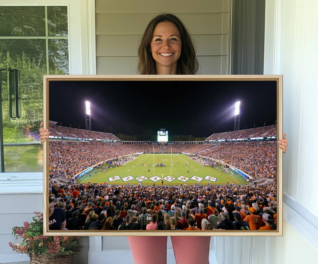 A Virginia Cavaliers Wall Art Canvas Print captures Scott Stadium filled with fans under the night sky.