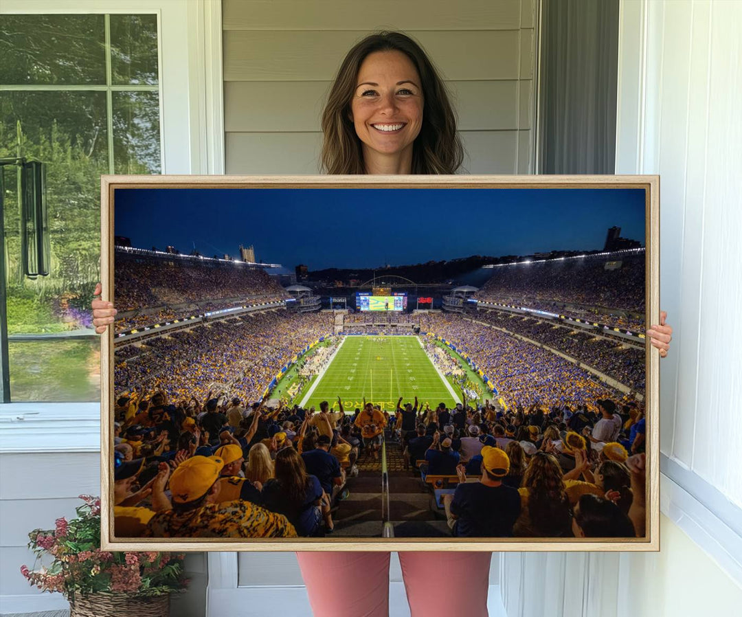 A Pittsburgh Panthers Acrisure Stadium canvas print captures the thrill of a packed stadium under lights and fans cheering.