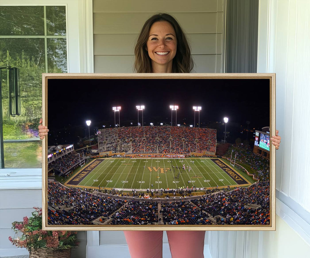 The Demon Deacons stadium print captures a brightly lit, bustling scene on museum-quality canvas.