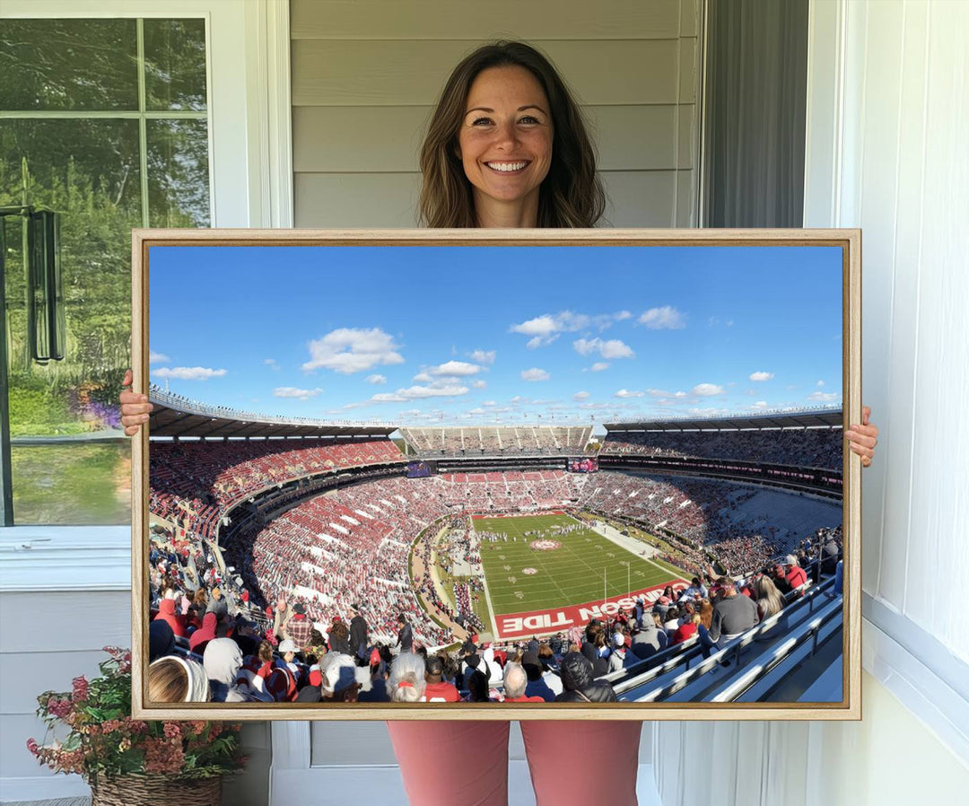 Canvas print of Alabama Crimson Tides Bryant-Denny Stadium, showcasing a sunlit field under a blue sky.