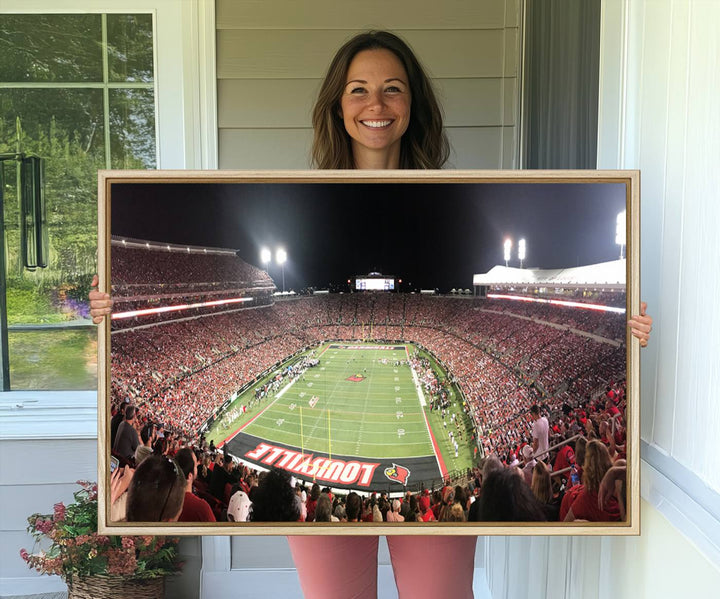 Panoramic view of a crowded football stadium with Louisville in the end zone, crafted as University of Louisville wall art.