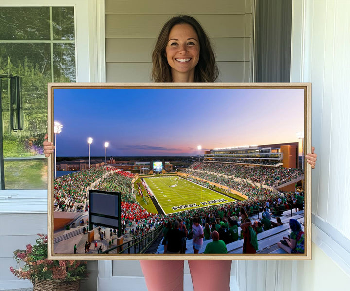 The canvas features Denton DATCU Stadium, OZEKI FIELD, illuminated under the lights and vibrant with fans supporting the University of North Texas.