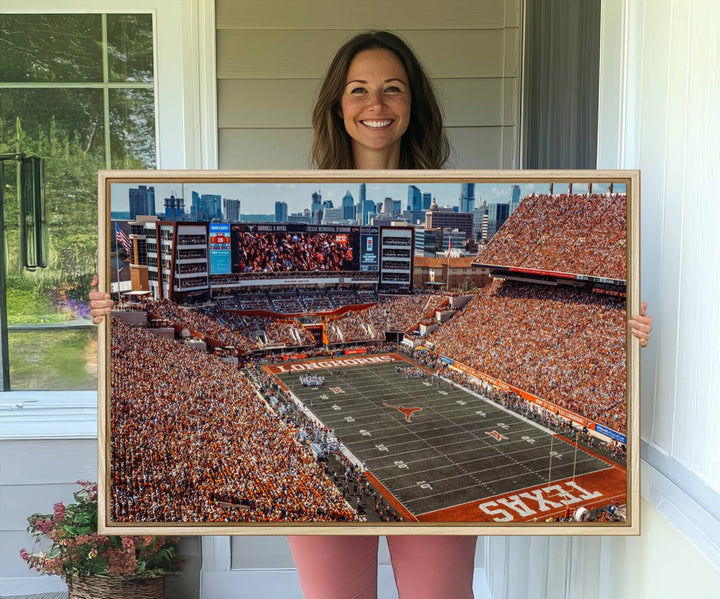 A premium canvas wall art featuring the University of Texas Longhorns stadium, showcasing a vibrant sea of orange.