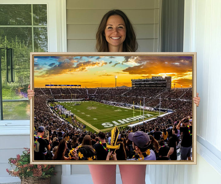 A sunset football game at UCFs Stadium—ideal as a premium wall art canvas print for your home.