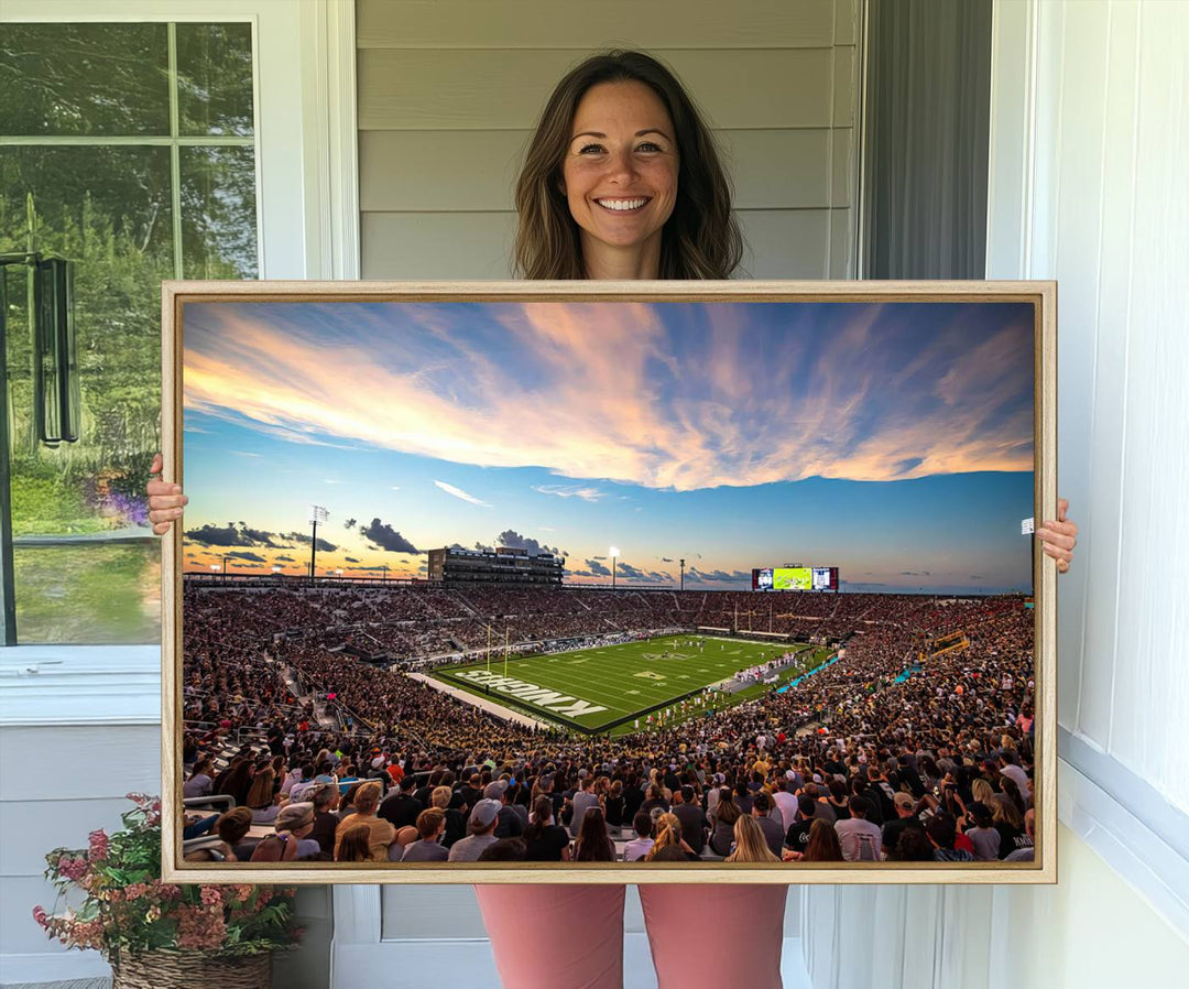 A vibrant wall art canvas captures a sunset scene at Orlandos FBC Mortgage Stadium, featuring the UCF Knights.