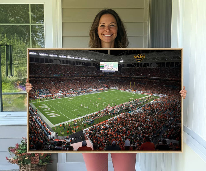 Aerial view of a Miami Hurricanes game at Hard Rock Stadium captured on canvas print, showcasing the teams on the field and fans in the stands.