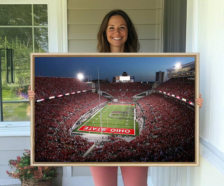 Premium gallery-quality canvas wall art featuring an aerial view of a packed Ohio State stadium at dusk, highlighting the Buckeyes.