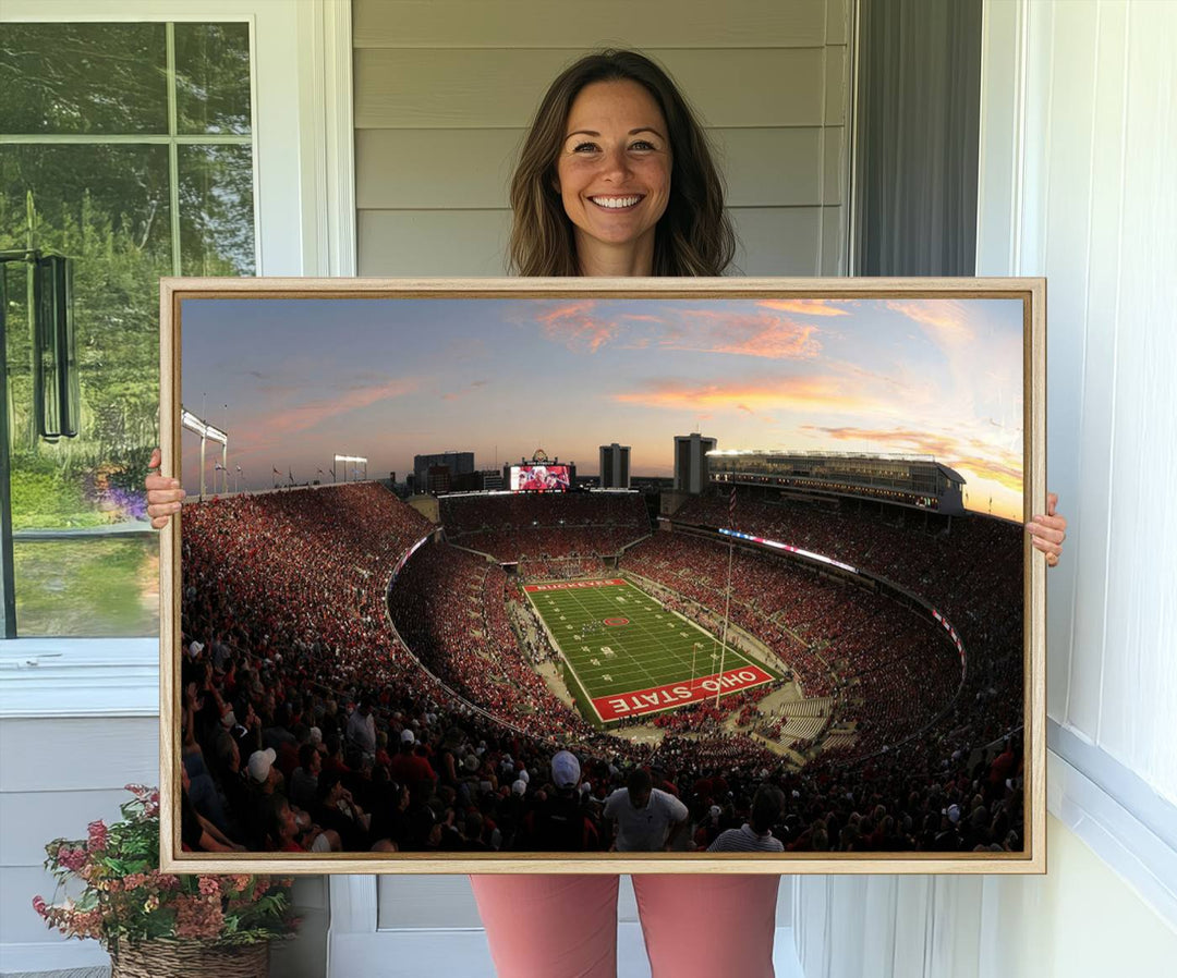 The canvas wall art captures a stunning stadium view of a sunset over Ohio State University Buckeyes football fans.