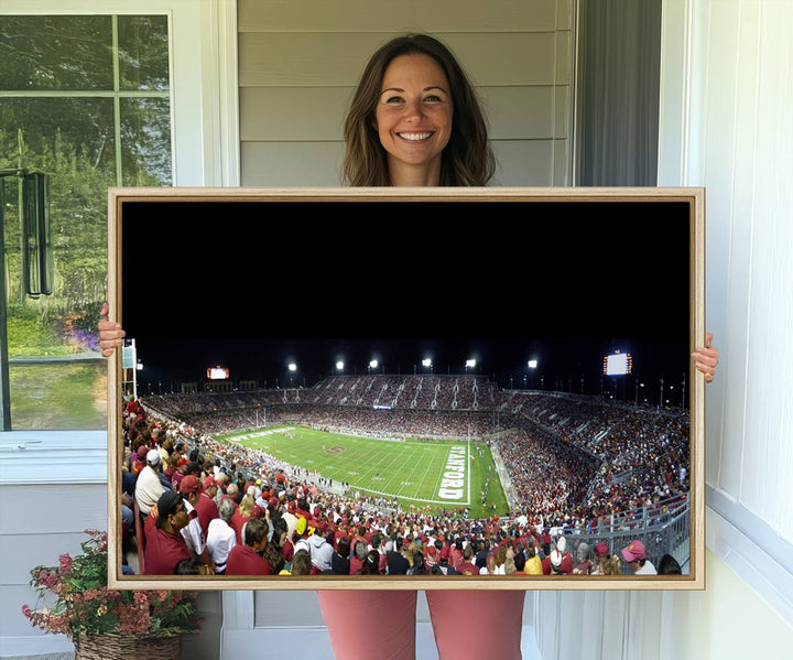 This Stanford University Cardinal Football Team canvas print, depicting fans in red filling Stanford Stadium at night, is perfect.