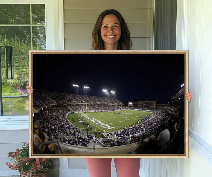 The wall art print features a night view of Amon G. Carter Stadium filled with TCU fans, showcased in the Horned Frogs Football Canvas Wall Art.