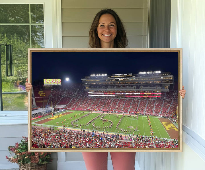 Canvas print depicting a packed stadium at night with a marching band forming USC, celebrating the Trojans at Los Angeles Memorial Coliseum.