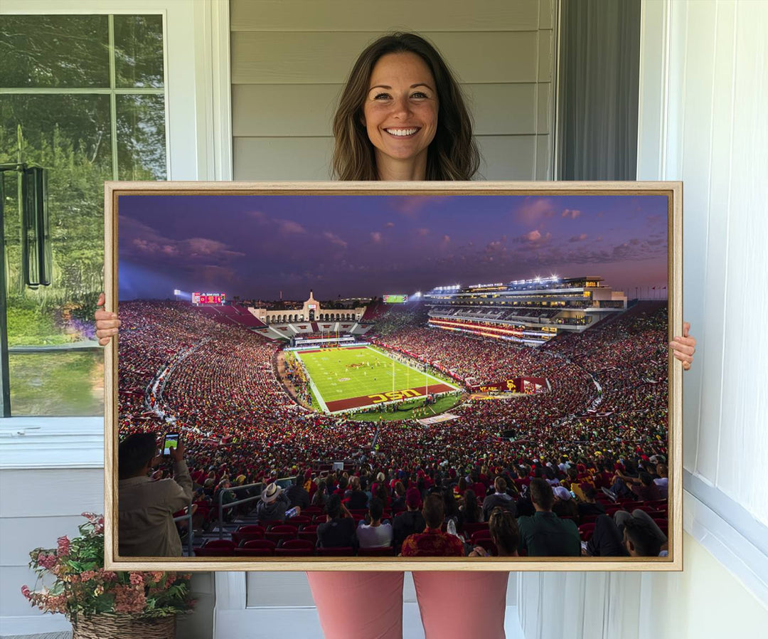 The vibrant wall art canvas print captures the USC Trojans playing under lights at dusk in LA Memorial Coliseum.