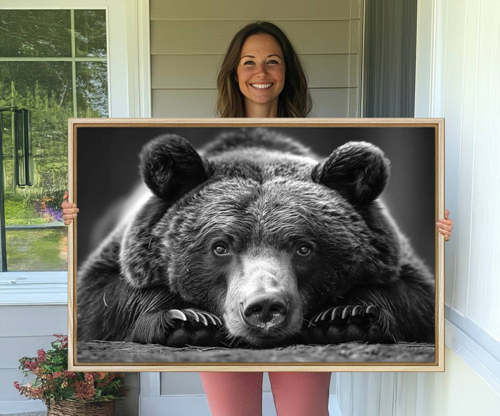 A black and white canvas print titled Resting Grizzly 399 Bear is displayed prominently.