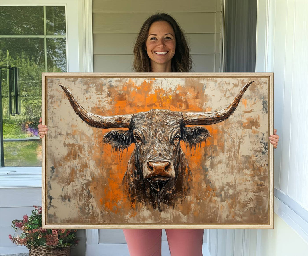 Abstract Cow Longhorn Bull Wall Art presents a detailed face centered on a textured orange and beige background.