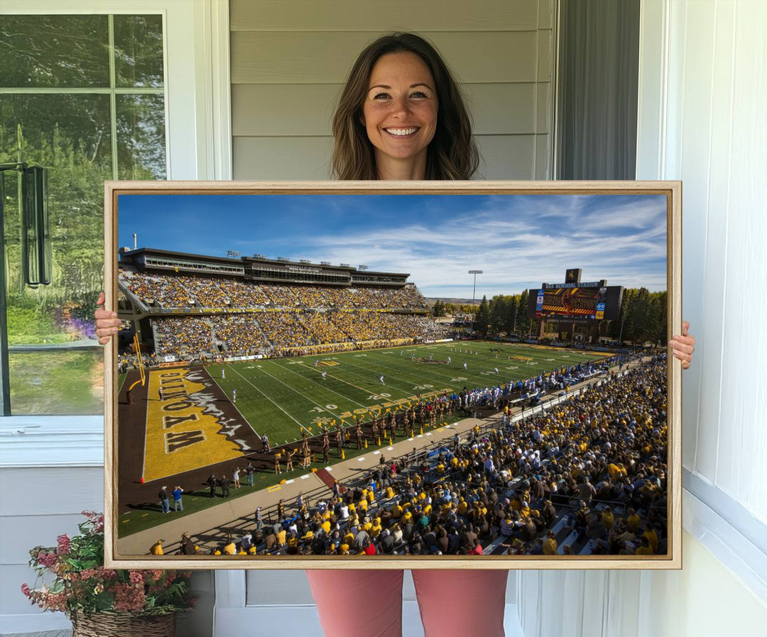 Canvas Wall Art Print: University of Wyoming Cowboys action at Jonah Field War Memorial Stadium under a sunny blue sky.