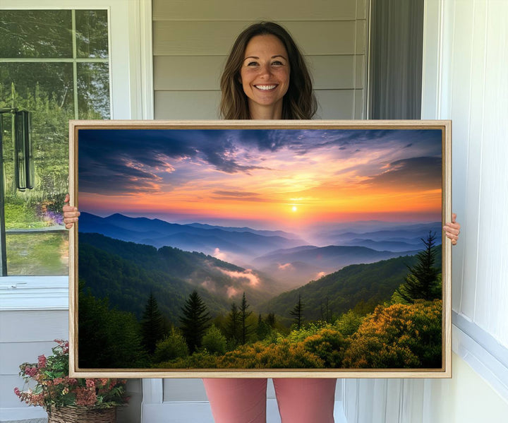 The Majestic Mountain Sunrise Print features a vibrant sky, layered hills, and evergreens, making it a stunning piece of wall decor.