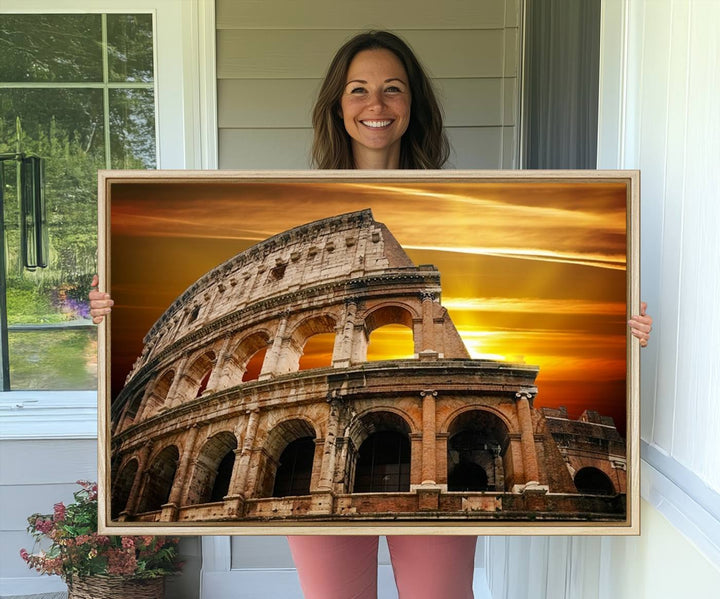 On the wall, theres a piece of art titled Colosseum with Yellow Sunset Behind, Italy.