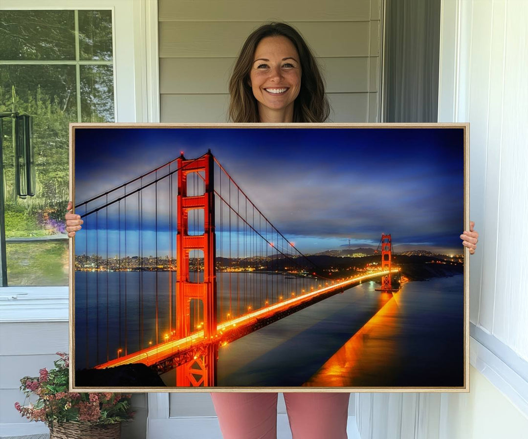 A large wall art San Francisco canvas print of the Golden Gate Bridge at twilight is displayed on a porch.