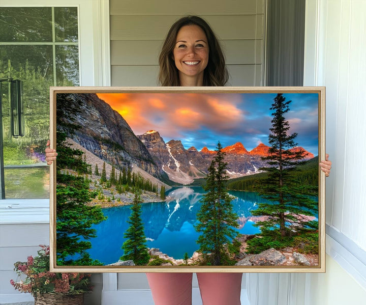 A kitchen featuring a Canadian Rockies Moraine Lake Wall Art Canvas Print displayed on the wall.