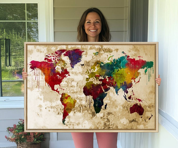 The Rainbow Colored Vintage World Map Canvas Print decorates the room.
