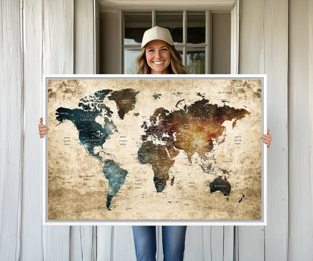 Vintage World Map Canvas Wall Art, perfect for antique-style decor, displayed against a light wood wall.