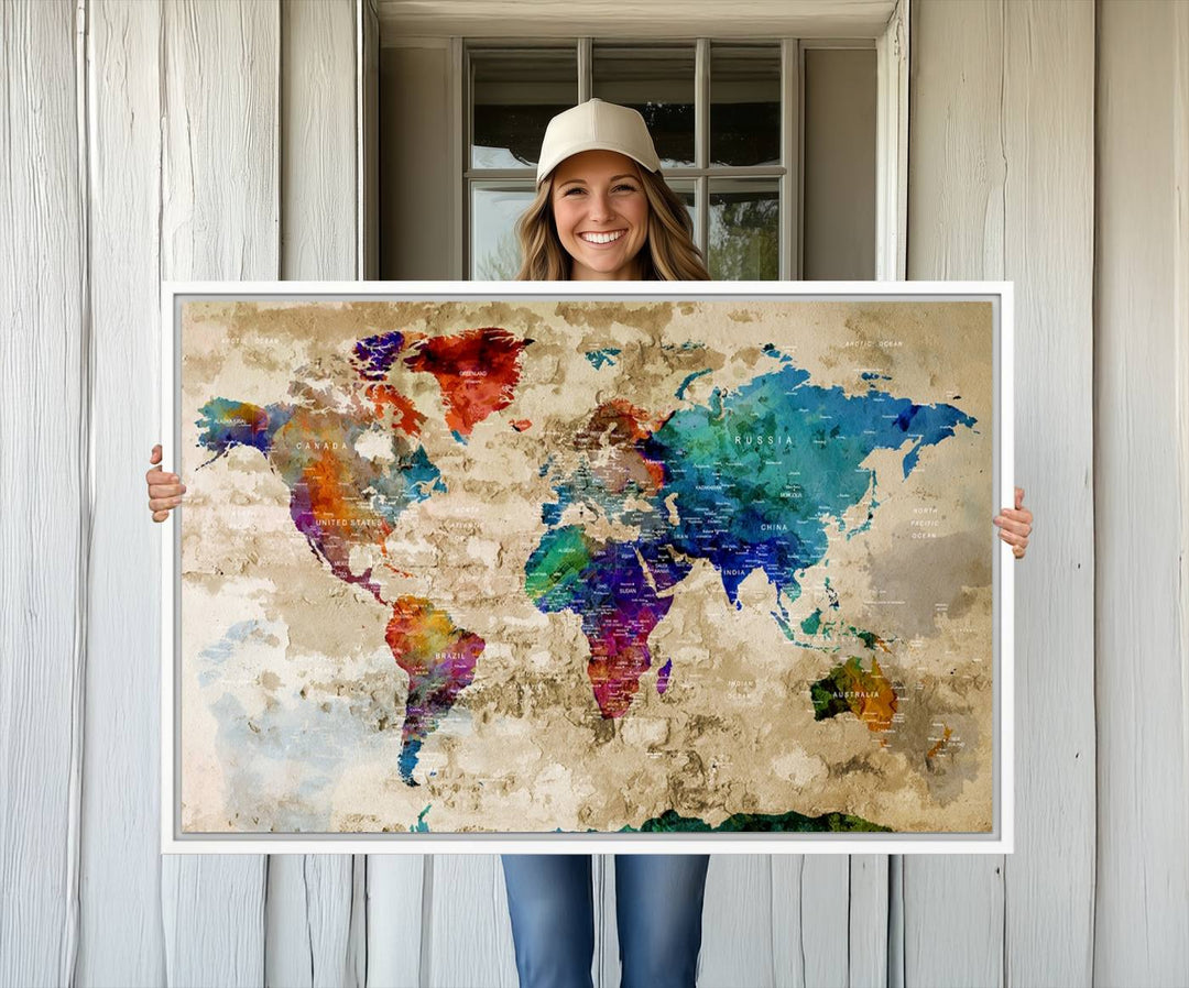 An Abstract Large Watercolor World Map Canvas Print hangs prominently.