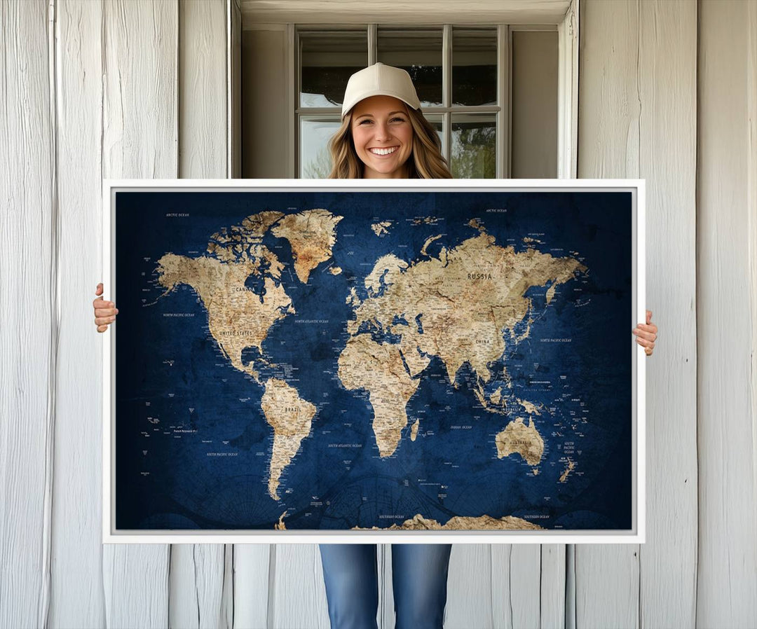 Classic Vintage Blue World Map Canvas Print featuring beige continents against a deep blue background.