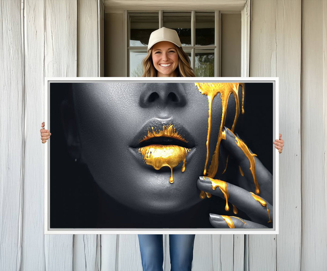 The Gold Lips and Black Woman Makeup Canvas Print features a chic monochrome face design, making it ideal for a modern dining room.