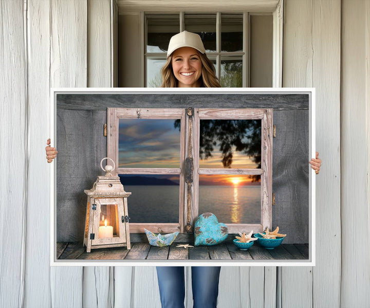 The Astonishing Sunset from the Window canvas print beautifully captures a sea view, accompanied by a lantern and starfish.