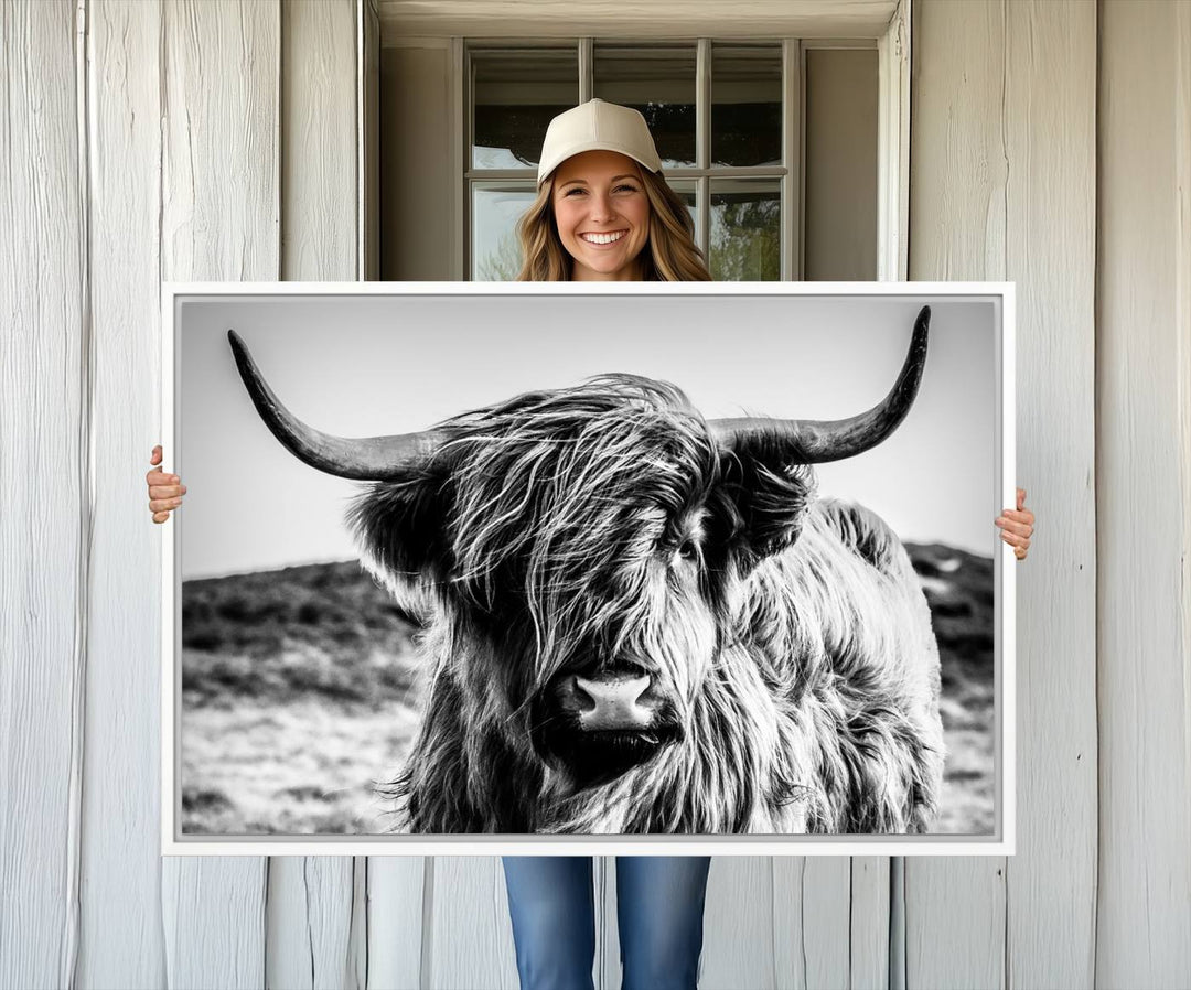 A Black and White Scottish Cow Canvas Print adorns the kitchen wall, perfect for farmhouse decor.