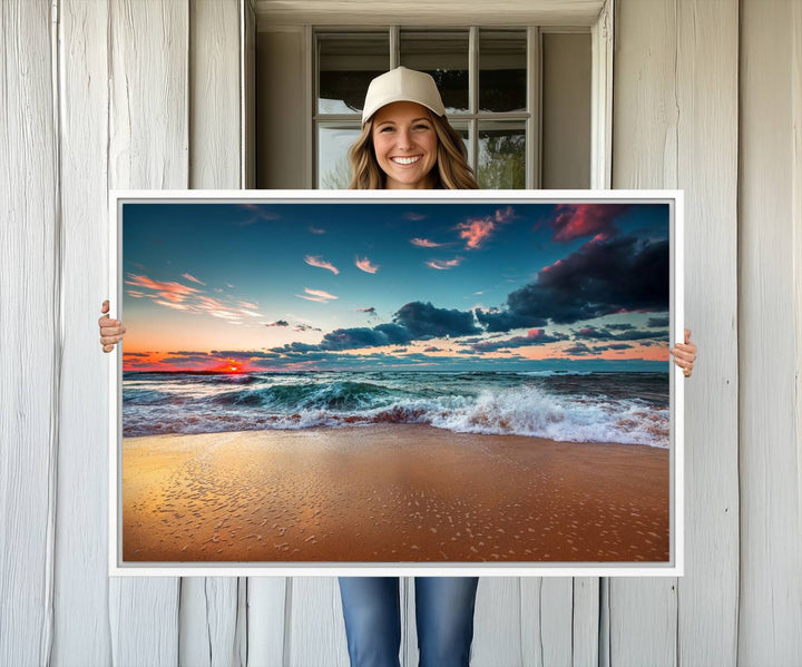 A large 3-panel sunset ocean beach canvas is displayed above the counter.